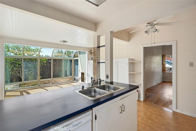 1811 Chorro St, San Luis Obispo, CA 93401 - kitchen featuring white cabinetry, a ceiling fan, dark countertops, white dishwasher, and a sink