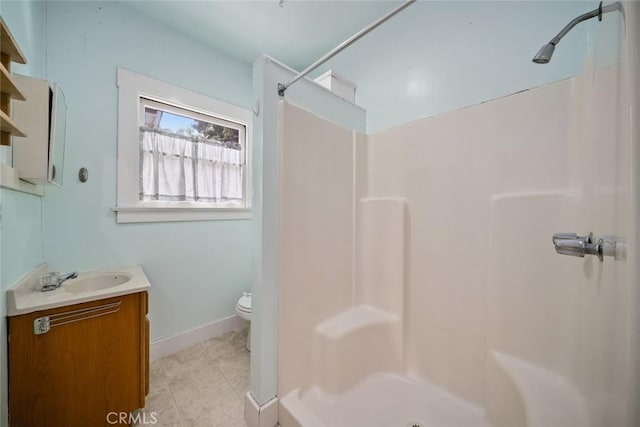 1811 Chorro St, San Luis Obispo, CA 93401 - full bathroom with a shower stall, vanity, baseboards, and toilet