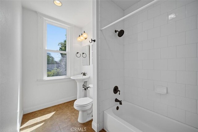 1811 Chorro St, San Luis Obispo, CA 93401 - bathroom featuring toilet, shower / bath combination, plenty of natural light, and tile patterned floors