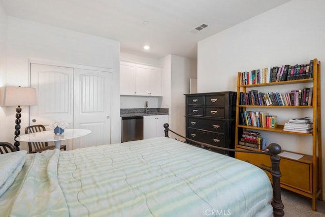 16540 Wyndham Ln Unit 10, Fontana, CA 92336 - bedroom featuring a closet, a sink, recessed lighting, and carpet floors