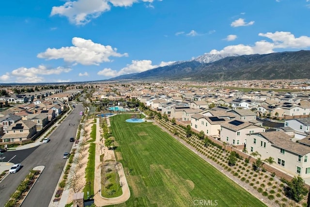 16540 Wyndham Ln Unit 10, Fontana, CA 92336 - aerial view of property and surrounding area with mountains and nearby suburban area