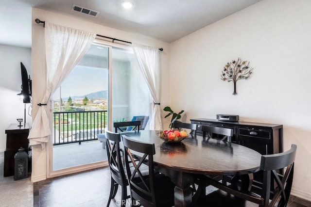 16540 Wyndham Ln Unit 10, Fontana, CA 92336 - dining area with baseboards