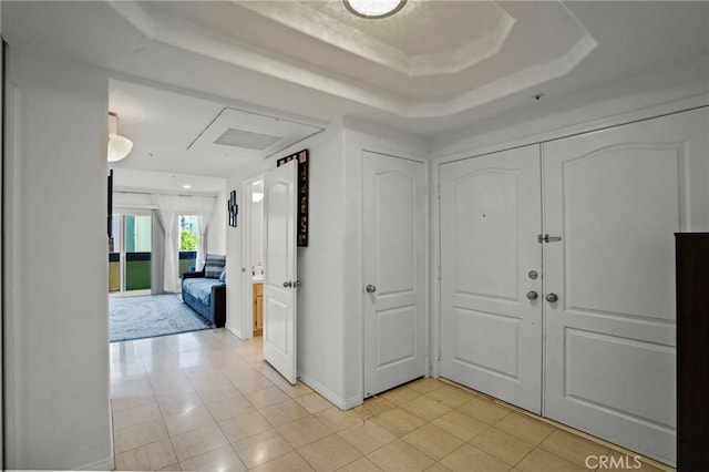 5224 Zelzah Ave Unit 108, Encino, CA 91316 - entryway with a raised ceiling and light tile patterned floors