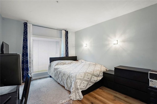 5224 Zelzah Ave Unit 108, Encino, CA 91316 - bedroom featuring wood finished floors