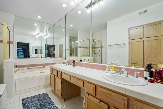 5224 Zelzah Ave Unit 108, Encino, CA 91316 - bathroom featuring a shower stall, tile patterned floors, visible vents, and a sink
