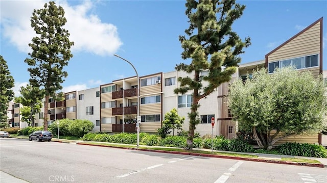 view of building exterior featuring a residential view