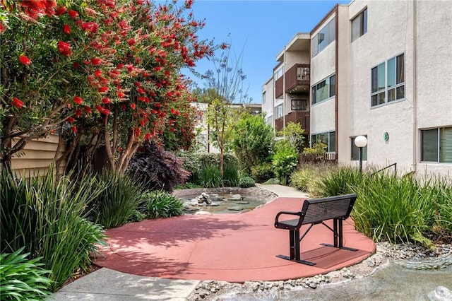 view of home's community with a patio