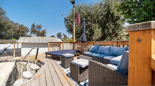 deck featuring outdoor lounge area