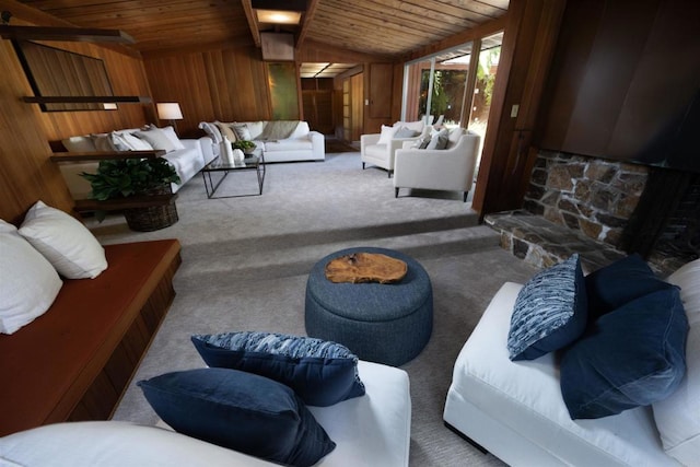 living area with wooden ceiling, vaulted ceiling, carpet flooring, and wooden walls