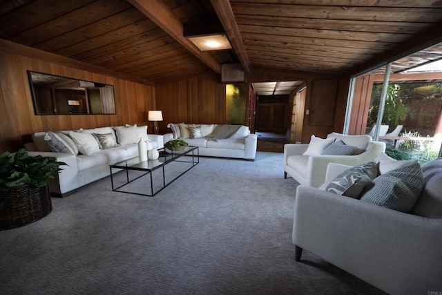 living room featuring lofted ceiling with beams, wooden walls, wooden ceiling, and carpet
