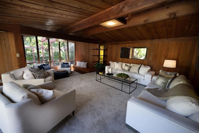 living room with vaulted ceiling with beams, wooden walls, and wooden ceiling