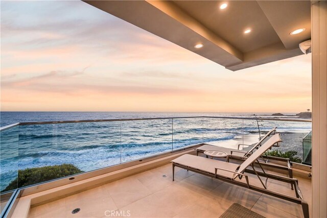 31091 Coast Hwy, Laguna Beach, CA 92651 - balcony at dusk featuring a water view