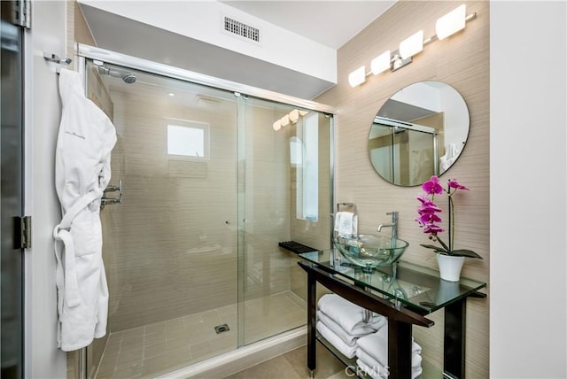 31091 Coast Hwy, Laguna Beach, CA 92651 - full bath with visible vents, a sink, and a stall shower