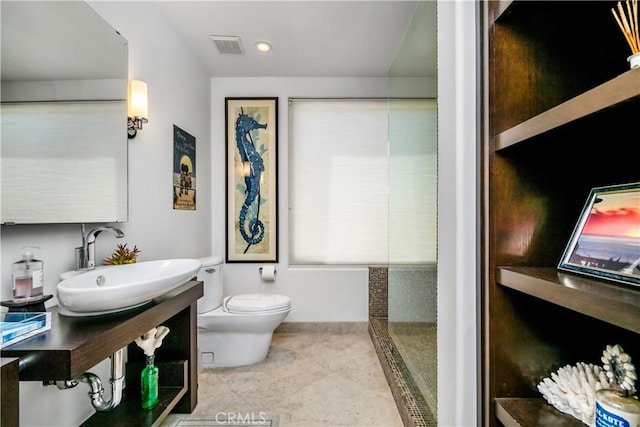 31091 Coast Hwy, Laguna Beach, CA 92651 - bathroom featuring toilet, a sink, visible vents, and walk in shower
