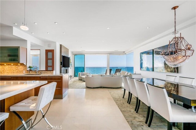 31091 Coast Hwy, Laguna Beach, CA 92651 - dining space with light tile patterned floors and recessed lighting