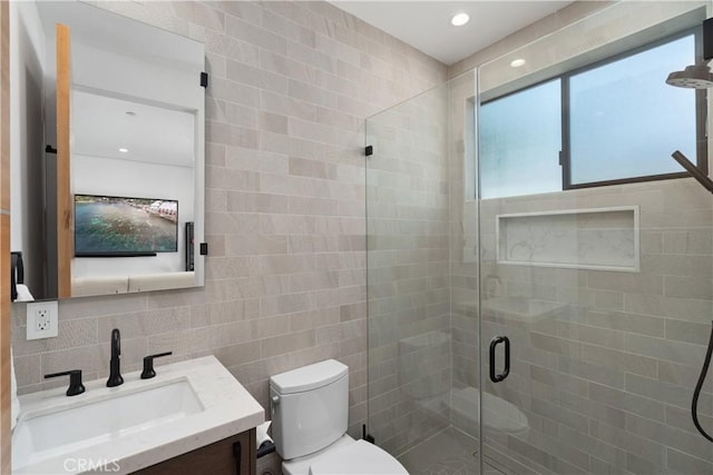 4739 Ventura Canyon Ave, Sherman Oaks, CA 91423 - full bathroom with a shower stall, toilet, recessed lighting, tile walls, and vanity