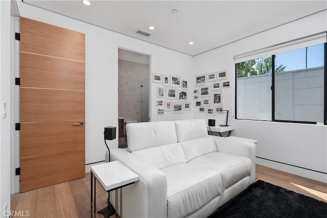 4739 Ventura Canyon Ave, Sherman Oaks, CA 91423 - living area featuring recessed lighting, visible vents, and wood finished floors