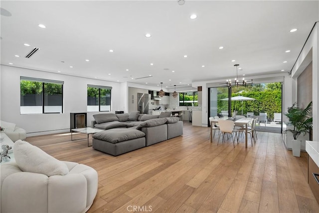 4739 Ventura Canyon Ave, Sherman Oaks, CA 91423 - living room featuring recessed lighting, visible vents, and light wood-style floors