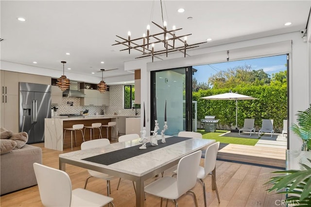 4739 Ventura Canyon Ave, Sherman Oaks, CA 91423 - dining room featuring recessed lighting, a chandelier, and light wood-type flooring