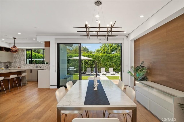 4739 Ventura Canyon Ave, Sherman Oaks, CA 91423 - dining room with a chandelier, recessed lighting, and light wood-style flooring