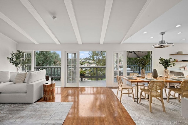 sunroom with beam ceiling