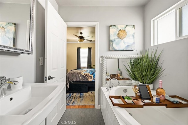 5717 4th Ave, Los Angeles, CA 90043 - ensuite bathroom with connected bathroom, wood finished floors, and a garden tub