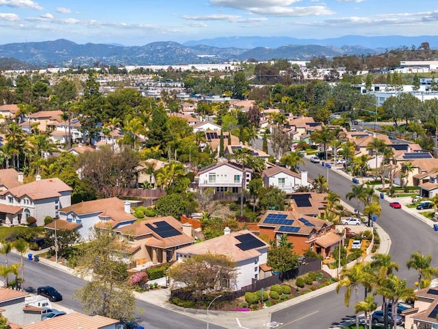 bird's eye view with a residential view and a mountain view