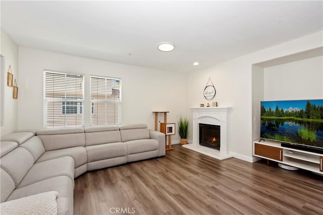 374 Quail Rdg, Irvine, CA 92603 - living area featuring wood finished floors, recessed lighting, and a glass covered fireplace