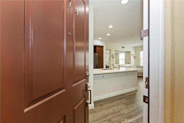 374 Quail Rdg, Irvine, CA 92603 - corridor featuring light wood finished floors and recessed lighting