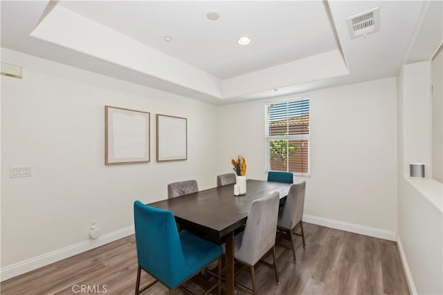 374 Quail Rdg, Irvine, CA 92603 - dining room with a tray ceiling, wood finished floors, and recessed lighting