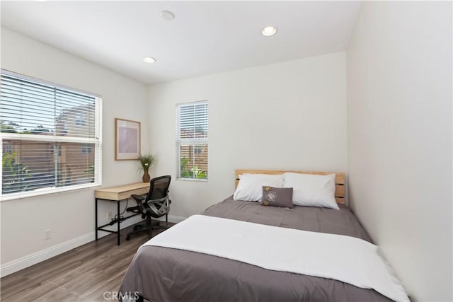 374 Quail Rdg, Irvine, CA 92603 - bedroom with multiple windows, wood finished floors, and recessed lighting