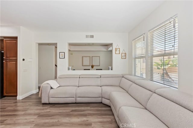 374 Quail Rdg, Irvine, CA 92603 - living room featuring light wood-style flooring and baseboards
