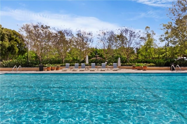374 Quail Rdg, Irvine, CA 92603 - community pool featuring view of wooded area