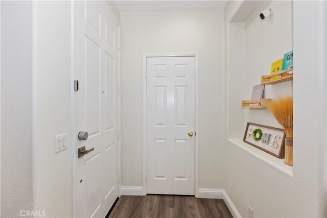 374 Quail Rdg, Irvine, CA 92603 - hall with dark wood-type flooring and baseboards