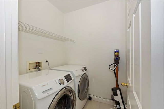 374 Quail Rdg, Irvine, CA 92603 - laundry room with separate washer and dryer and light tile patterned floors