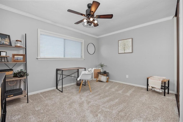 office area featuring a ceiling fan, baseboards, crown molding, and carpet floors