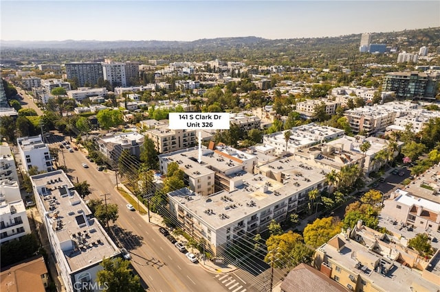 aerial view featuring a city view and a mountain view