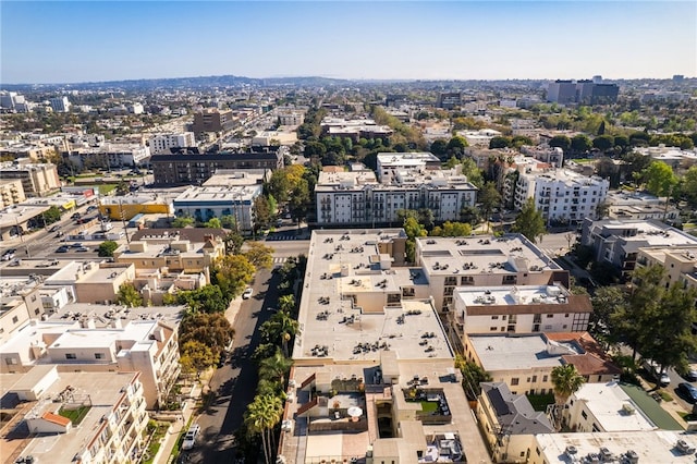 drone / aerial view featuring a city view