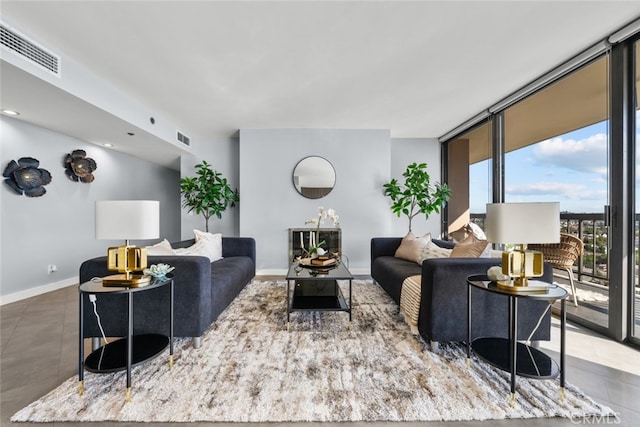 222 Monterey Rd Unit 1203, Glendale, CA 91206 - living area with visible vents, baseboards, and expansive windows