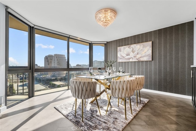 222 Monterey Rd Unit 1203, Glendale, CA 91206 - dining space featuring wallpapered walls, a view of city, baseboards, and expansive windows