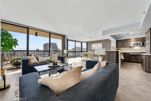 222 Monterey Rd Unit 1203, Glendale, CA 91206 - living area featuring a wall of windows and a city view