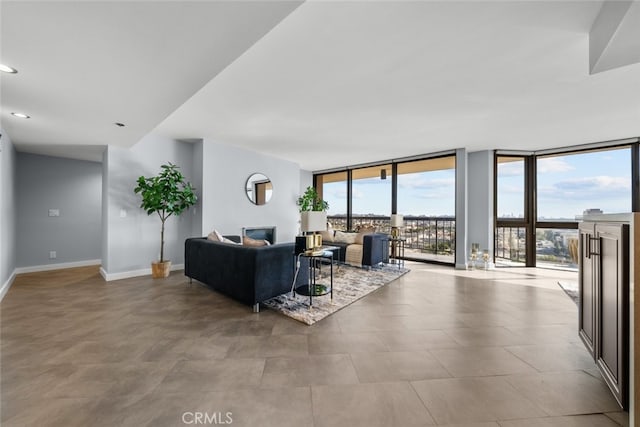 222 Monterey Rd Unit 1203, Glendale, CA 91206 - living room featuring floor to ceiling windows, baseboards, and recessed lighting