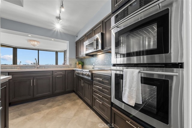 222 Monterey Rd Unit 1203, Glendale, CA 91206 - kitchen featuring dark brown cabinets, light countertops, decorative backsplash, and appliances with stainless steel finishes