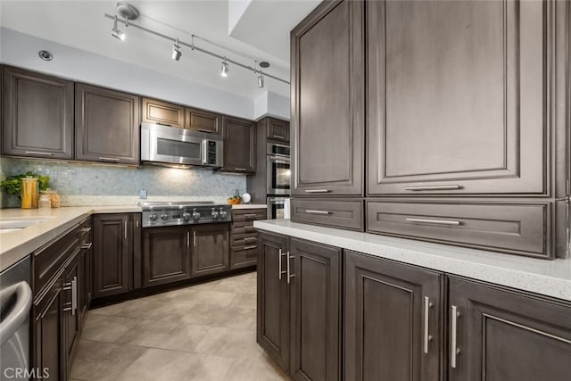 222 Monterey Rd Unit 1203, Glendale, CA 91206 - kitchen with a sink, decorative backsplash, dark brown cabinets, and stainless steel appliances