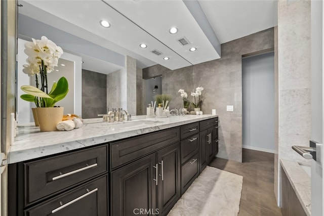 222 Monterey Rd Unit 1203, Glendale, CA 91206 - bathroom featuring vanity, recessed lighting, visible vents, and tile walls