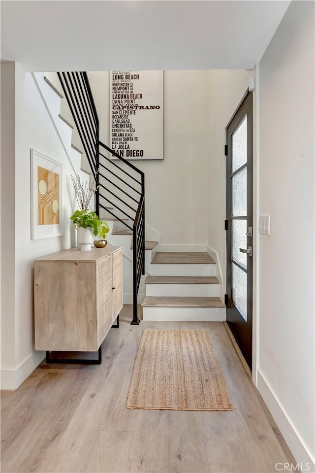 32152 Via Carlos, San Juan Capistrano, CA 92675 - foyer with stairway and light wood-style flooring