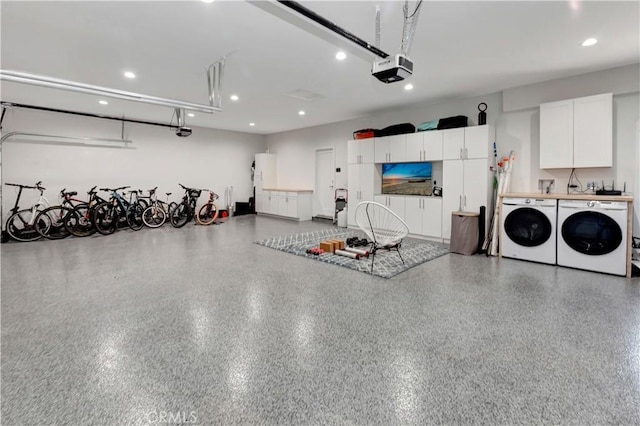 32152 Via Carlos, San Juan Capistrano, CA 92675 - garage with separate washer and dryer, a garage door opener, and recessed lighting