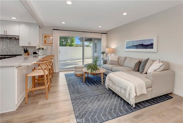 32152 Via Carlos, San Juan Capistrano, CA 92675 - living room featuring light wood-style flooring and recessed lighting