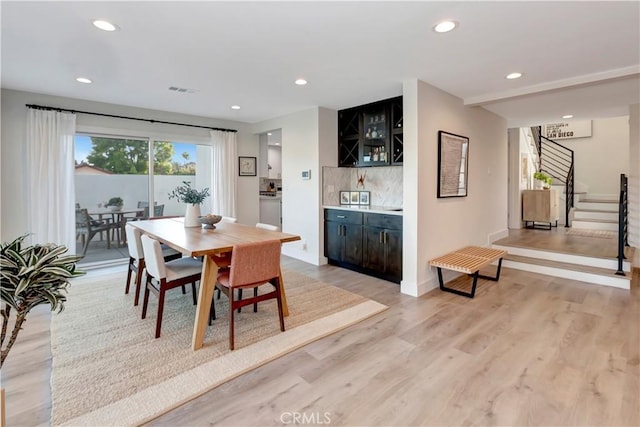 32152 Via Carlos, San Juan Capistrano, CA 92675 - dining space featuring light wood-style flooring, stairway, and recessed lighting