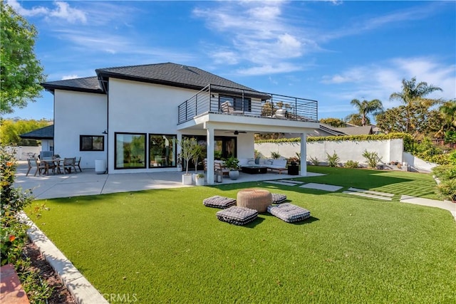 32152 Via Carlos, San Juan Capistrano, CA 92675 - rear view of property with a balcony, an outdoor hangout area, a patio area, and stucco siding